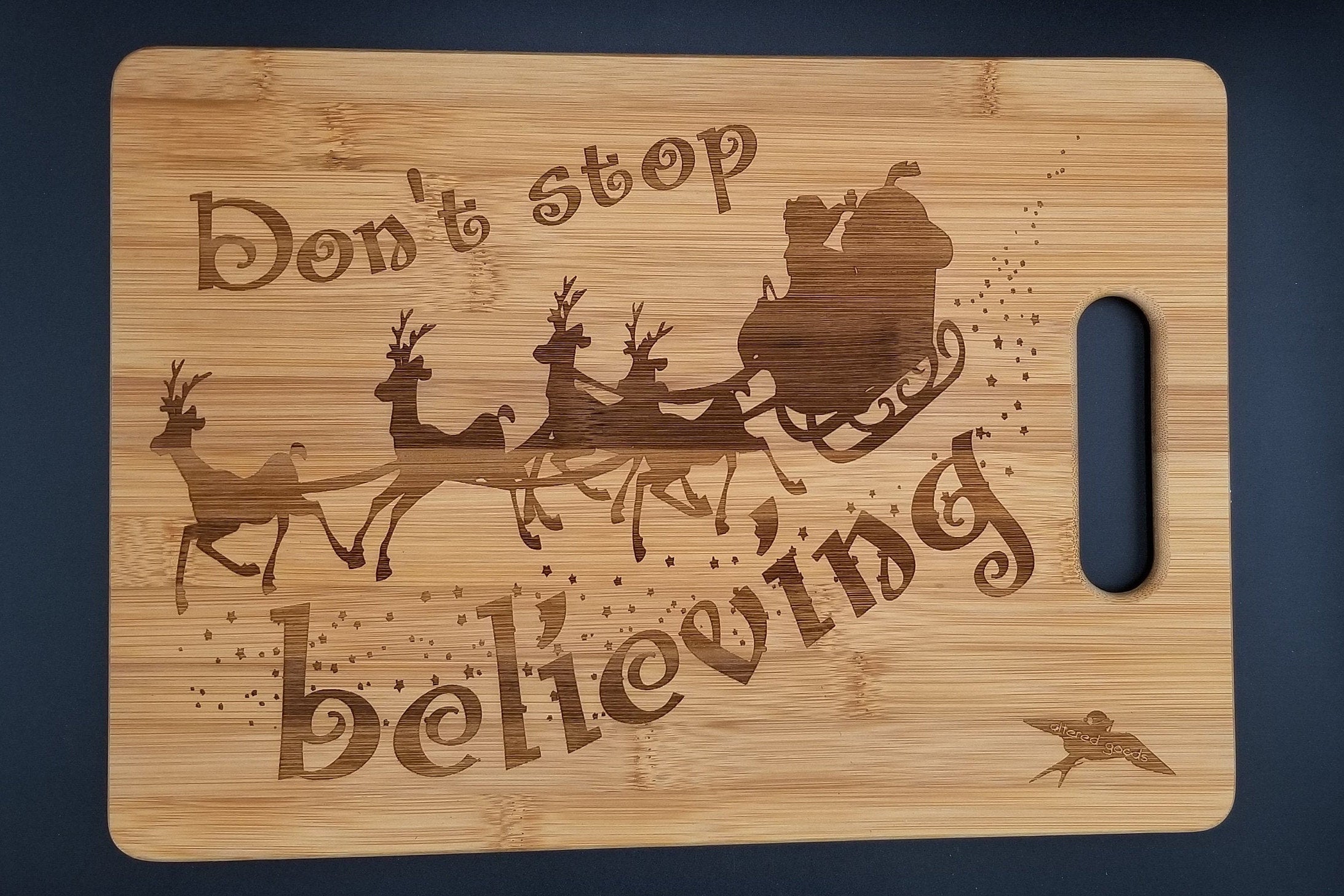 the-worlds-leading-online-shop-for-dont-stop-believing-santa-bamboo-cutting-board-discount_0.jpg