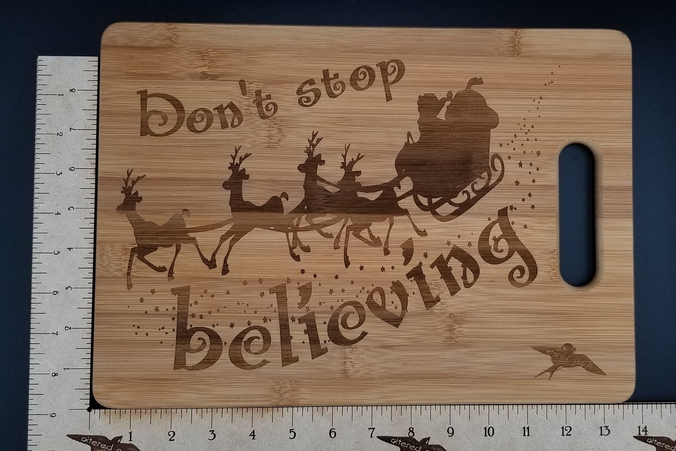 the-worlds-leading-online-shop-for-dont-stop-believing-santa-bamboo-cutting-board-discount_1.jpg